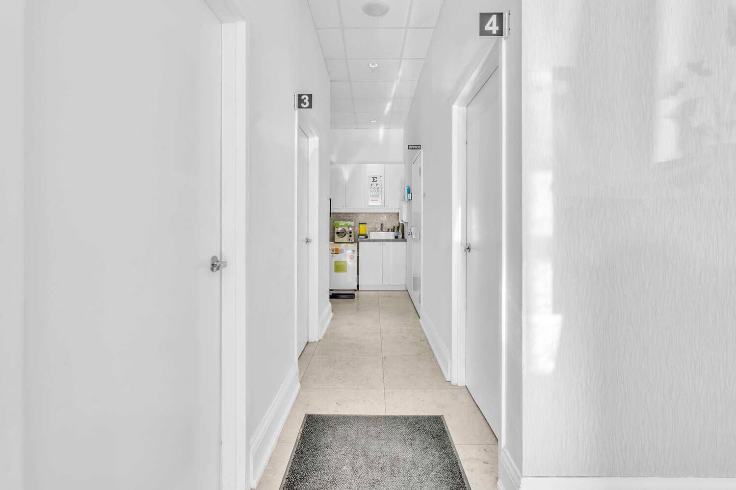 Exam room hallway with eye chart